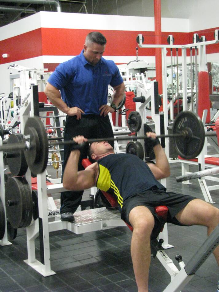 CT Personal Trainer, Jim Cipriani, spots one of his clients