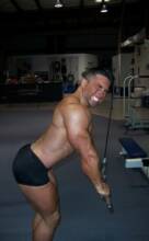 CT Personal Trainer trains his triceps with pushdowns